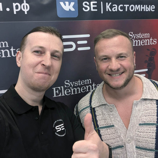 Дмитрий Журавлёв с наушниками System Elements